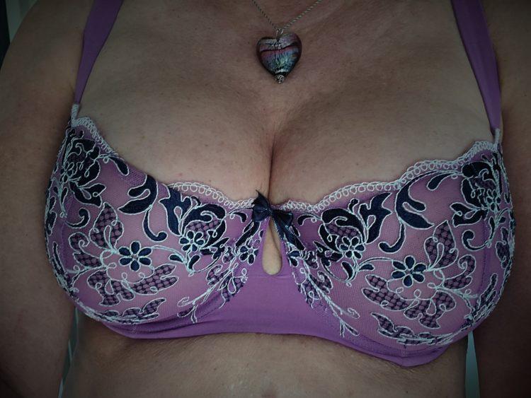 Ruby Ryder shares photo of her breasts wearing a lavender lace low cut bra