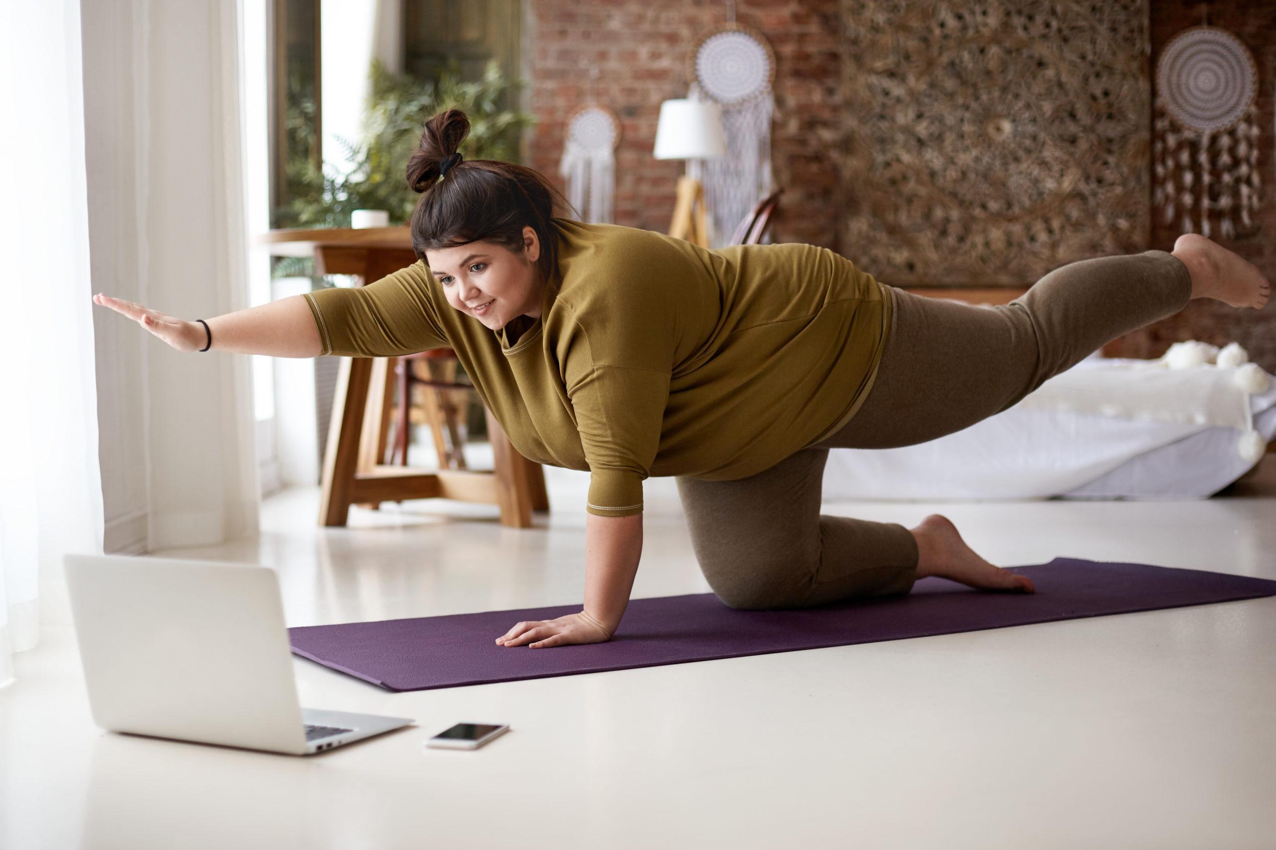 Ruby Ryder shares curvy woman doing exercises, watching video lesson online on open laptop computer trengthen core, watching video lesson online on open laptop computer