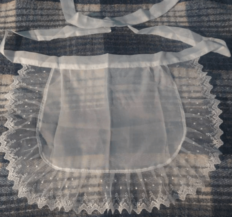 The apron that helped Frank feel better about his cage.